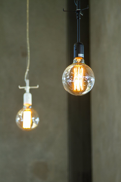 New Wave Construction Cafe Renovation hanging light bulb glass