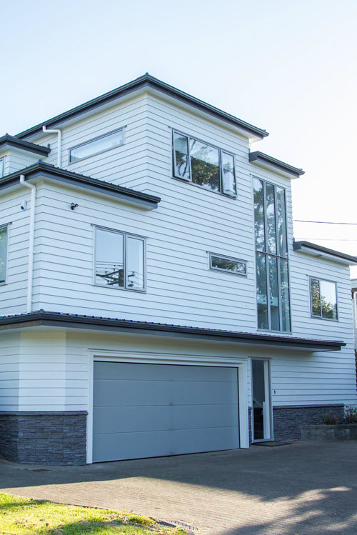 New Wave Construction Renovation three story five bedrooms