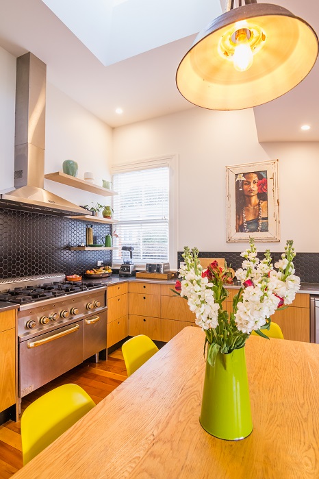 New Wave Construction Villa Renovation Kitchen with plywood custom and Large Skylight