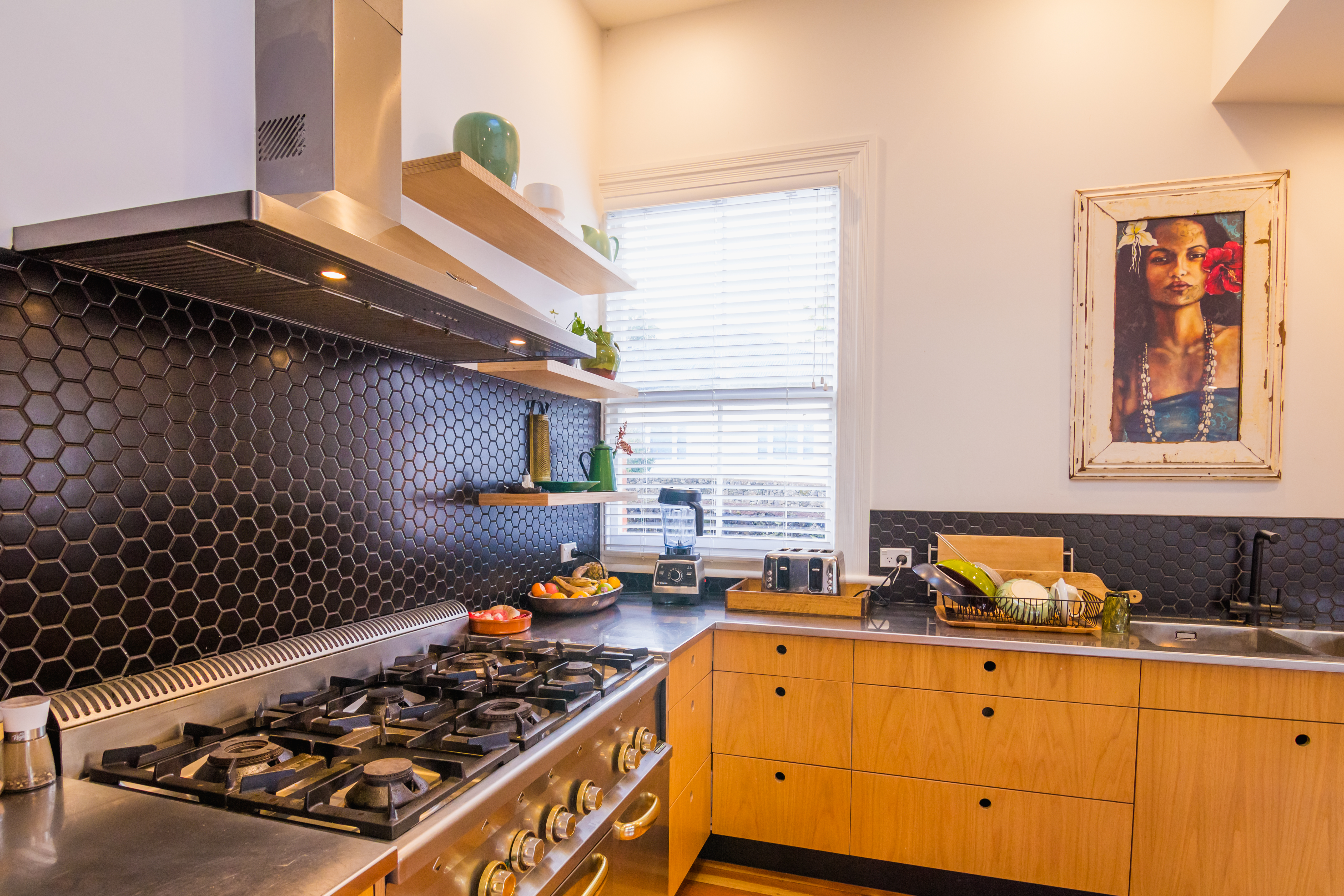 New Wave Construction Villa Renovation Kitchen with plywood custom and Large Skylight