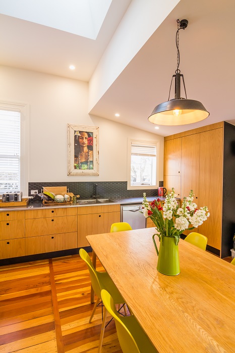 New Wave Construction Villa Renovation Kitchen with plywood custom and Large Skylight